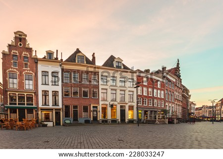 Ancient row of houses in the historic Dutch city of Zutphen during sunset