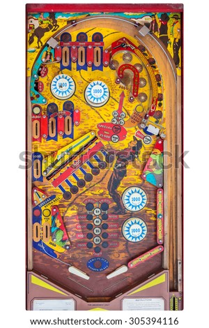 DIEREN, THE NETHERLANDS - MAY 10, 2015: Top view of a vintage pinball machine with western cowboy decoration in Dieren, The Netherlands