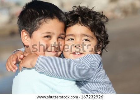 portrait of hugging little brothers