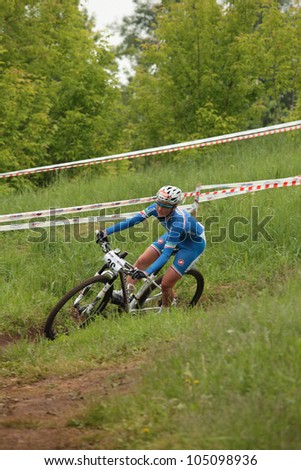 MOSCOW, RUSSIA - JUNE 7: Eva Lechner (Italy) in team relay during European Mountain Bike Cross-country Championship in Moscow, Russia at June 7, 2012.