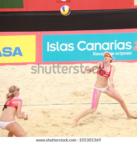 MOSCOW, RUSSIA - JUNE 8: Kolocova-Slukova, Czech Republic vs Evgenia Ukolova (left) and Ekaterina Khomyakova (right), Russia during Beach Volleyball Swatch World Tour in Moscow, Russia at June 8, 2012