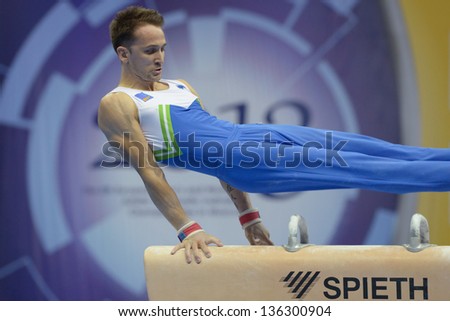 MOSCOW, RUSSIA - APRIL 20: Saso Bertoncelj, Slovenia performs exercise on pommel horse in final of 5th European Championships in Artistic Gymnastics in Moscow, Russia on April 20, 2013