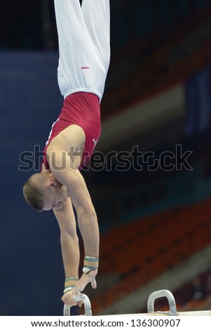 MOSCOW, RUSSIA - APRIL 20: Krisztian Berki, Hungary performs exercise on pommel horse in final of 5th European Championships in Artistic Gymnastics in Moscow, Russia on April 20, 2013