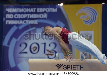 MOSCOW, RUSSIA - APRIL 20: Krisztian Berki, Hungary performs exercise on pommel horse in final of 5th European Championships in Artistic Gymnastics in Moscow, Russia on April 20, 2013