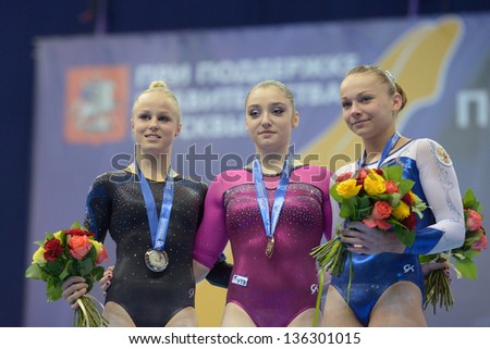 MOSCOW, RUSSIA - APRIL 20: Medalists on uneven bars in European Championships in Artistic Gymnastics in Moscow, Russia on April 20, 2013. Left to right Adlerteg, Sweden, Mustafina, Paseka, both Russia