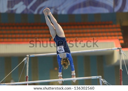 MOSCOW, RUSSIA - APRIL 20: Ida Gustafsson, Sweden performs exercise on uneven bars in final of 5th European Championships in Artistic Gymnastics in Moscow, Russia on April 20, 2013