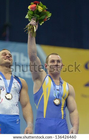 MOSCOW, RUSSIA - APRIL 20: Radivilov, Ukraine, right, and Ait Said, France win gold medals on still rings on 5th European Championships in Artistic Gymnastics in Moscow, Russia on April 20, 2013