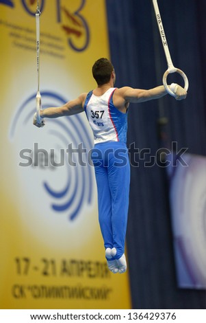 MOSCOW, RUSSIA - APRIL 21: Samir Ait Said, France performs exercise on still rings in final of 5th European Championships in Artistic Gymnastics in Moscow, Russia on April 20, 2013