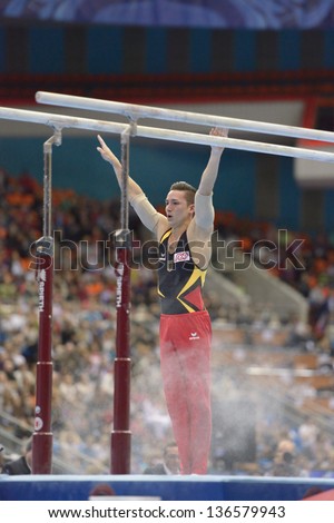 MOSCOW, RUSSIA - APRIL 21: Marcel Nguyen, Germany finished exercise on parallel bars in final of 5th European Championships in Artistic Gymnastics in Moscow, Russia on April 21, 2013