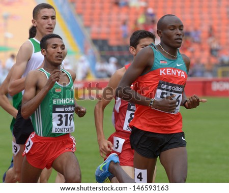 DONETSK, UKRAINE - JULY 11: Athletes compete in the heat on 1500 meters during 8th IAAF World Youth Championships in Donetsk, Ukraine on July 11, 2013