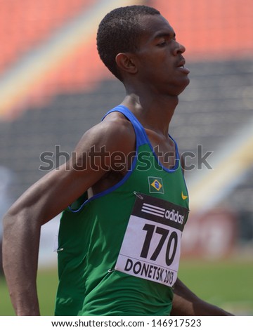 DONETSK, UKRAINE - JULY 12: Vitor Hugo dos Santos of Brazil win the heat in 200 metres during 8th IAAF World Youth Championships in Donetsk, Ukraine on July 12, 2013