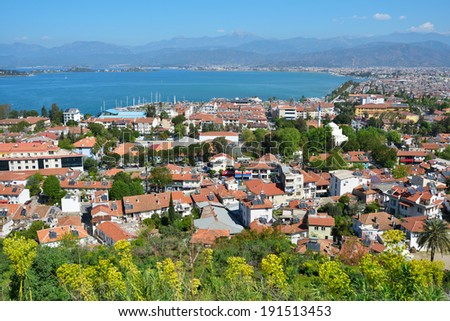 FETHIYE, TURKEY - APRIL 1, 2014: View to the bay from the castle. Dozens boat tours to 12 islands of the bay offered to the tourists every day in summer