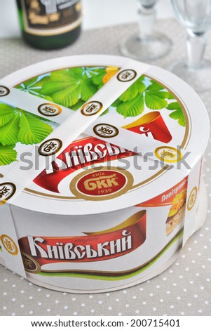 DNEPROPETROVSK, UKRAINE - MAY 25, 2014: Box with Kiev cake on the table. This brand of dessert cake made in Kiev, Ukraine since 1956, is one of the \