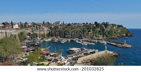 ANTALYA, TURKEY - MARCH 26, 2014: Yachts and trip boats in the port of Antalya. Boat trip is lovely leisure activity for thousands of tourists