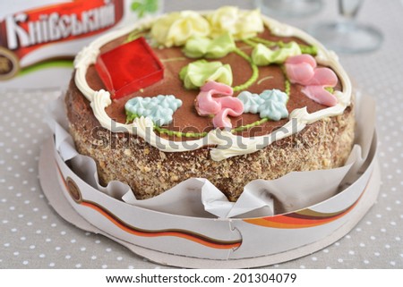 DNEPROPETROVSK, UKRAINE - MAY 25, 2014: Kiev cake on the table. This brand of dessert cake made in Kiev, Ukraine since 1956, is one of the \