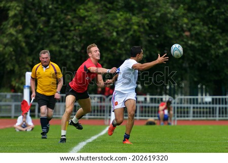 MOSCOW, RUSSIA - JUNE 29, 2014: Rugby match for place 7 France (white uniform) vs Belgium during the FIRA-AER European Grand Prix Series. Belgium won 43-0