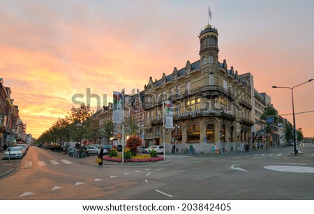 MAASTRICHT, NETHERLANDS - SEPTEMBER 7, 2013: People in front of Grand Hotel near the train station of Maastricht. The city is considered as the oldest one in Netherlands