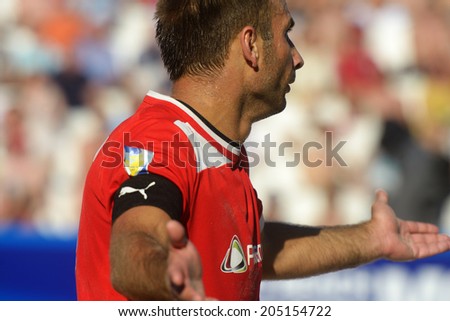 MOSCOW, RUSSIA - JULY 13, 2014: Belarus team captain Vadzim Bokach in the match with Greece during Moscow stage of Euro Beach Soccer League. Belarus won 6-5