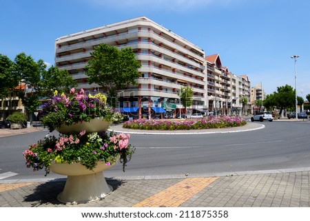 ARCACHON, FRANCE - JUNE 27, 2013: Flowers on the Boulevard du General Leclerc. Arcachon was found in 1857, and is known for the \