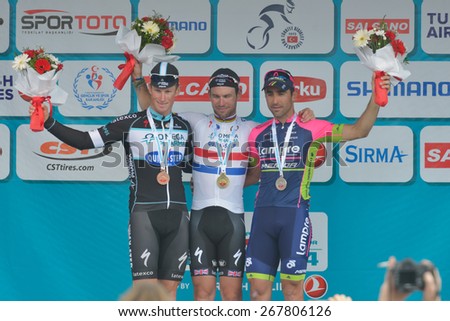 MARMARIS, TURKEY - APRIL 30, 2014: Award ceremony of 4th stage of 50th Presidential Cycling Tour of Turkey. Winners left to right: Mark Renshaw, Mark Cavendish, Ariel Maximiliano Richeze Araquistain