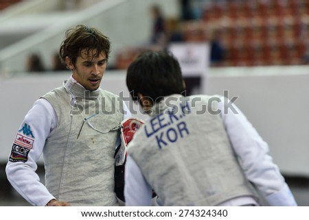ST. PETERSBURG, RUSSIA - MAY 1, 2015: Andrea Baldini of Italy vs Kwanghyun Lee of Korea during 41th International fencing tournament St. Petersburg Foil. The tournament is the stage of FIE World Cup