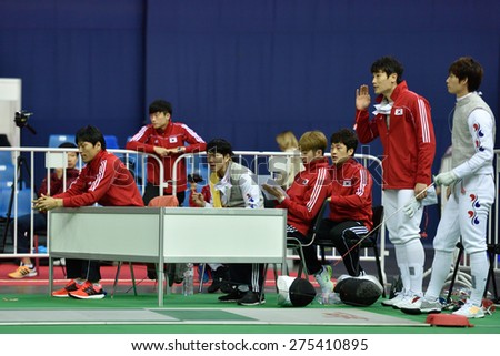 ST. PETERSBURG, RUSSIA - MAY 3, 2015: Korean team during team quarterfinal match against Italy in International fencing tournament St. Petersburg Foil. The tournament is the stage of FIE World Cup
