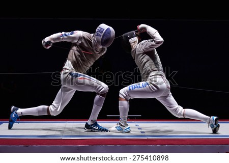 ST. PETERSBURG, RUSSIA - MAY 3, 2015: Match for 3rd place Italy vs France during 41th International fencing tournament St. Petersburg Foil. The tournament is the stage of FIE World Cup