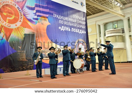 ST. PETERSBURG, RUSSIA - MAY 6, 2015: Military orchestra plays on the opening ceremony of International freestyle wrestling tournament Victory Day in Mikhailovsky manege