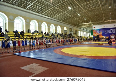 ST. PETERSBURG, RUSSIA - MAY 6, 2015: Parade during the opening ceremony of International freestyle wrestling tournament Victory Day in Mikhailovsky manege. The event dedicated to the Victory in WWII