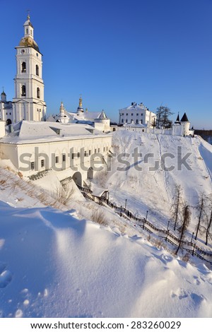 Tobolsk Kremlin with cathedral belfry in a winter day
