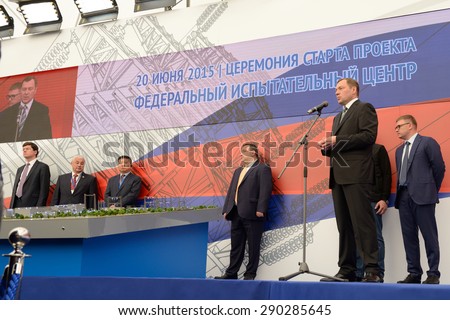 ST. PETERSBURG, RUSSIA - JUNE 20, 2015: General director of JSC Russian Grids Oleg Budargin (right) delivers opening remarks during the presentation of the project of the Federal Test Center