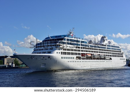 ST. PETERSBURG, RUSSIA - JUNE 27, 2015: Cruise liner Ocean Princess of Princess Cruises company departs from the Neva river. The ship provide luxury cruise for 680 guests