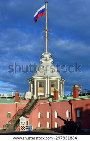 ST. PETERSBURG, RUSSIA - JUNE 11, 2015: Flag of Russia on the Flagstaff Tower of Naryshkin Bastion in St. Peter and Paul Fortress. The tower was erected in 1731