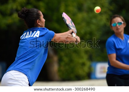 MOSCOW, RUSSIA - JULY 17, 2015: Sofia Cimatti (left) and Eva d\'Elia of Italy in action during the ITF Beach Tennis World Team Championship. 28 nations compete in the event this year