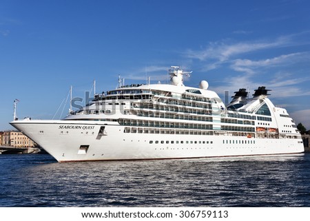 ST. PETERSBURG, RUSSIA - AUGUST 5, 2015: Cruise liner Seabourn Quest departs from the Neva river. The ship built in 2011 provides luxury cruise for 450 guests