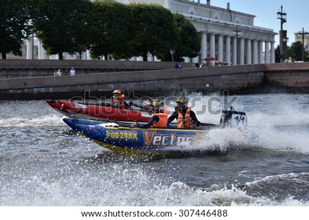 ST. PETERSBURG, RUSSIA - AUGUST 15, 2015: Unidentified riders go to the start of the River marathon Oreshek Fortress race. This international motorboat competitions is held since 2003