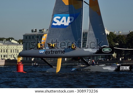 ST. PETERSBURG, RUSSIA - AUGUST 21, 2015: Catamaran of SAP Extreme Sailing Team of Denmark during the 2nd day of St. Petersburg stage of Extreme Sailing Series. Red Bull Team leading after the 1st day