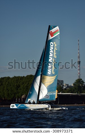 ST. PETERSBURG, RUSSIA - AUGUST 20, 2015: Catamaran of Oman Air sailing team during the 1st day of St. Petersburg stage of Extreme Sailing Series. Red Bull Sailing Team of Austria won the day