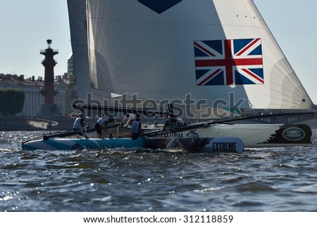 ST. PETERSBURG, RUSSIA - AUGUST 21, 2015: Catamaran of GAC Pindar sailing team of UK during the 2nd day of St. Petersburg stage of Extreme Sailing Series. Red Bull Sailing Team leading after 1st day