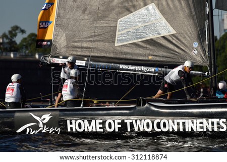 ST. PETERSBURG, RUSSIA - AUGUST 21, 2015: Catamaran of Team Turx of Turkey during 2nd day of St. Petersburg stage of Extreme Sailing Series. Red Bull Sailing Team of Austria leading after the 1st day