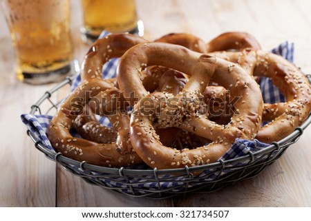 Pretzels and beer on a rustic table