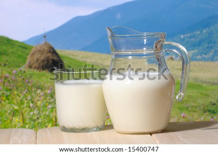 Milk jug  against a mountains in background
