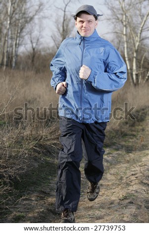 Running man in turquoise sportswear