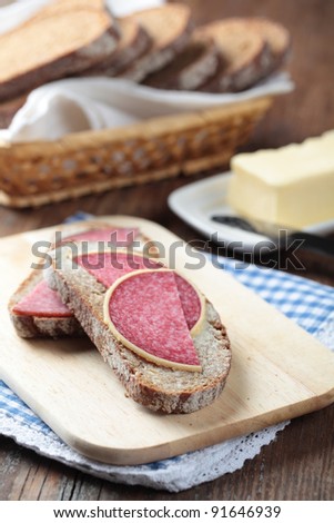 Open sandwiches with Parmesan salami and butter