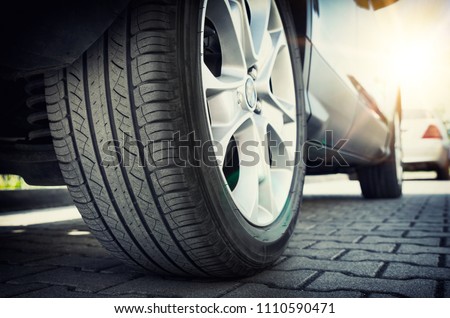 Similar – Image, Stock Photo Closeup of car tires in winter on the dirt road covered with ice, snow and gravel