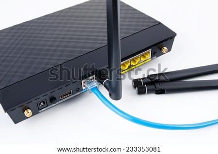Modern wireless wi-fi router isolated on white background.