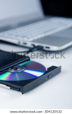External optical disc writer. Compact device connected via USB port. CD, DVD backup data.