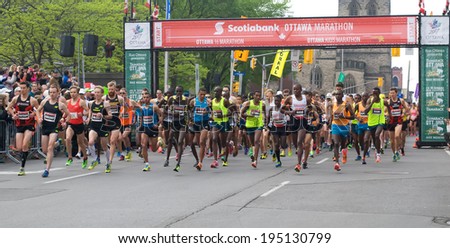 OTTAWA - MAY 25: Mass start of the Ottawa marathon on May 25, 2014 in Ottawa.