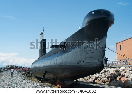 RIMOUSKI, QUEBEC – CIRCA JULY 2009:  Decommissioned Canadian navy submarine HMCS Onondaga was put ashore circa July 2009 in Rimouski, Canada. The submarine was opened to public in June 2009.