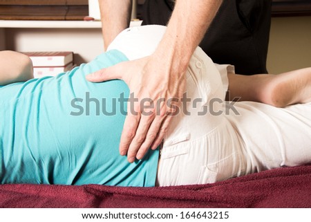 Lower back of patient will be message by doctor